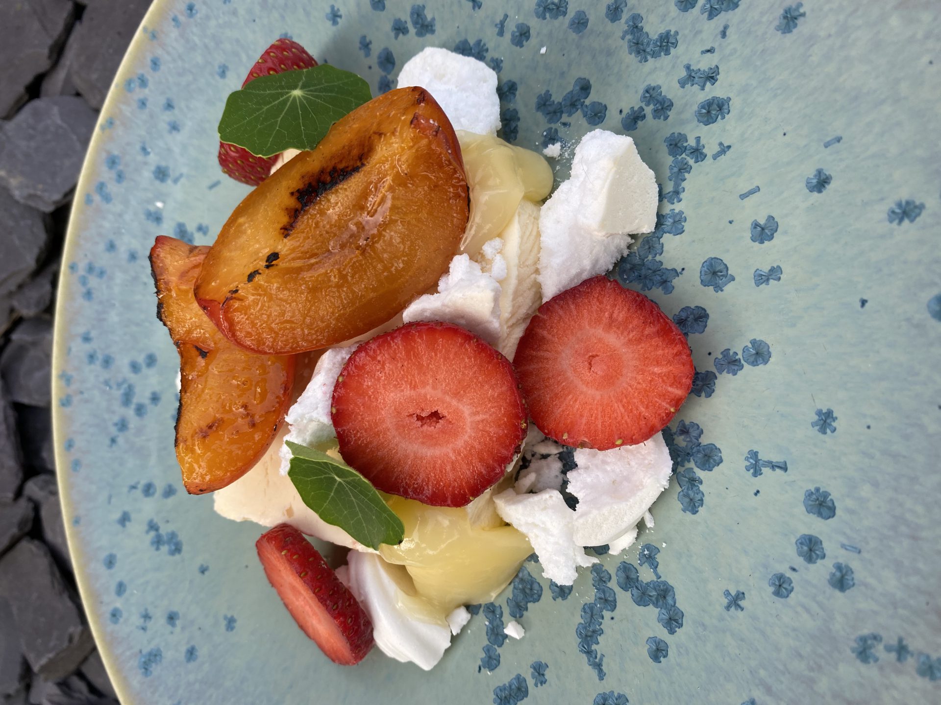 Lemon curd mousse with griddled apricots, crushed meringues and ...